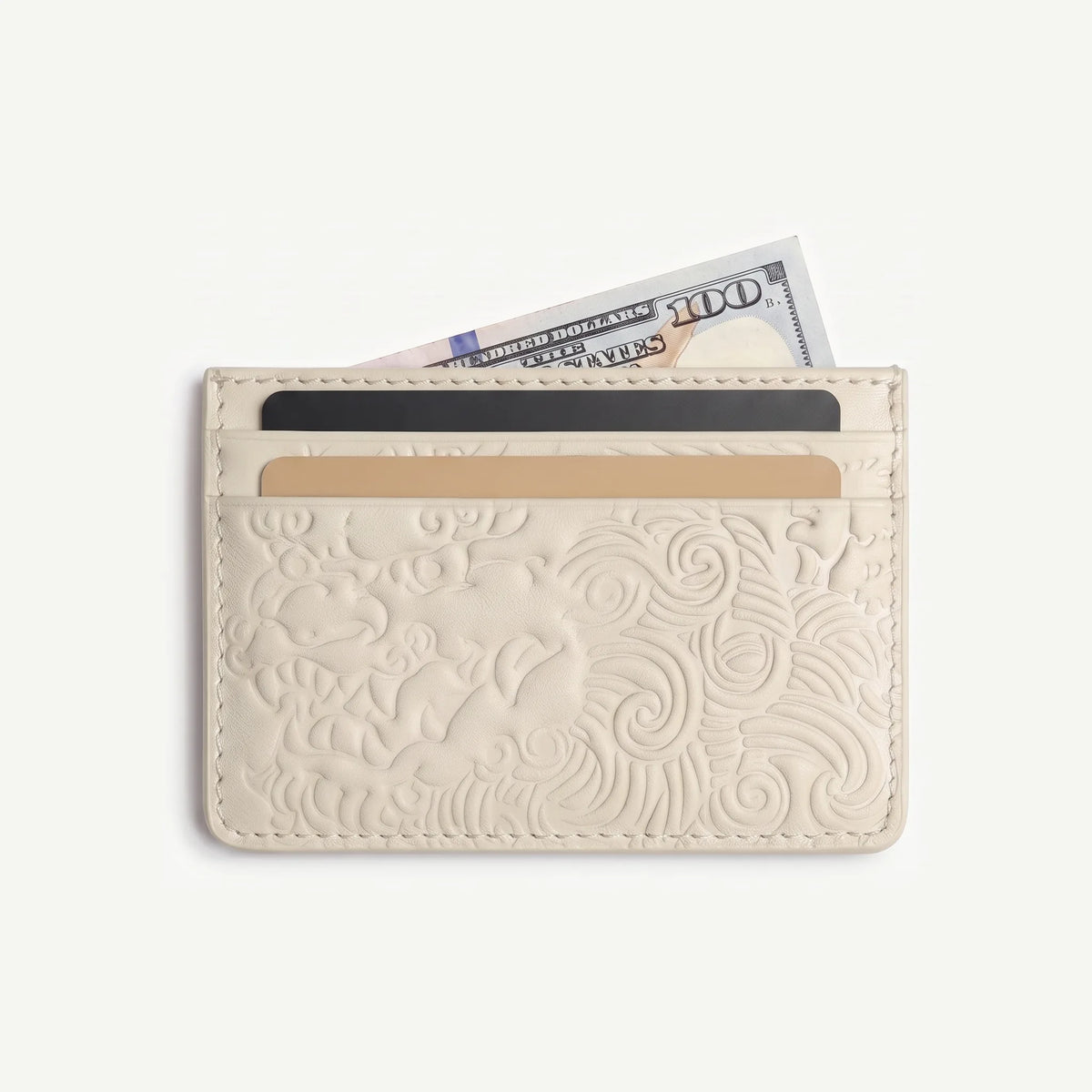 Bone shishi embossed card holder, with cards inside