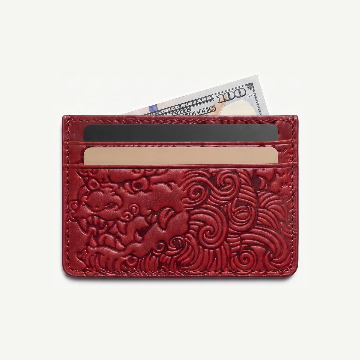 Oxblood shishi embossed card holder, with cards inside