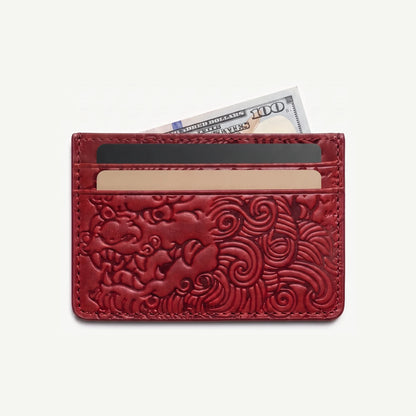 Oxblood shishi embossed card holder, with cards inside