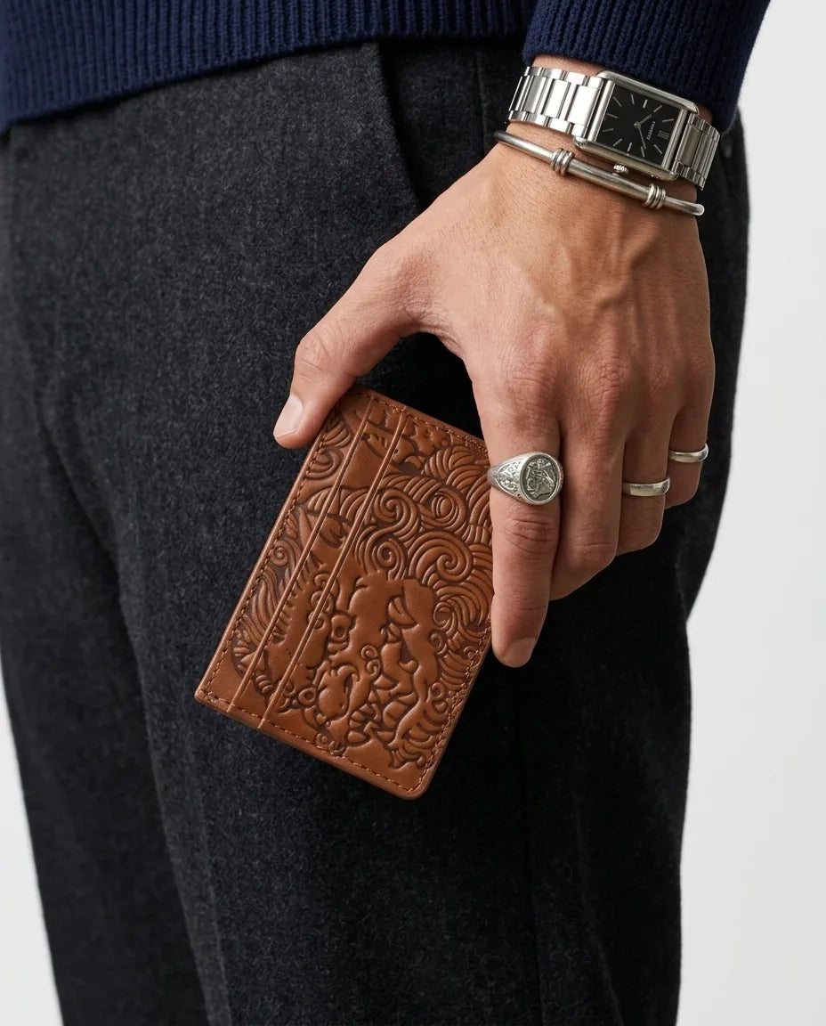 Saddle Brown shishi embossed card holder, held in hand