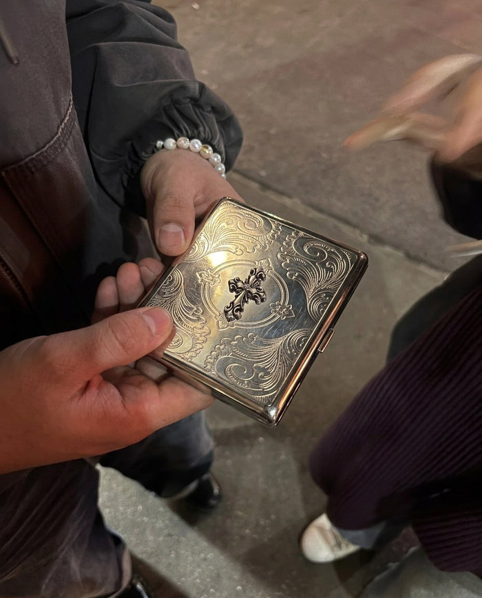Tin card case in the wild — Chapel Cross