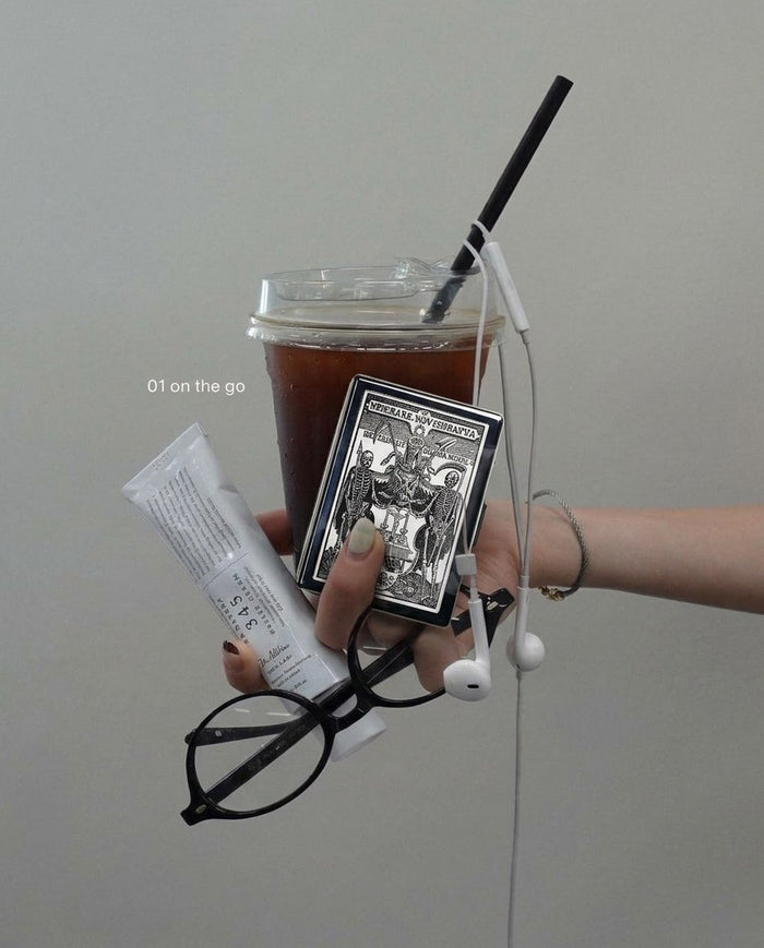 Tin card case in the wild — Danse Macabre